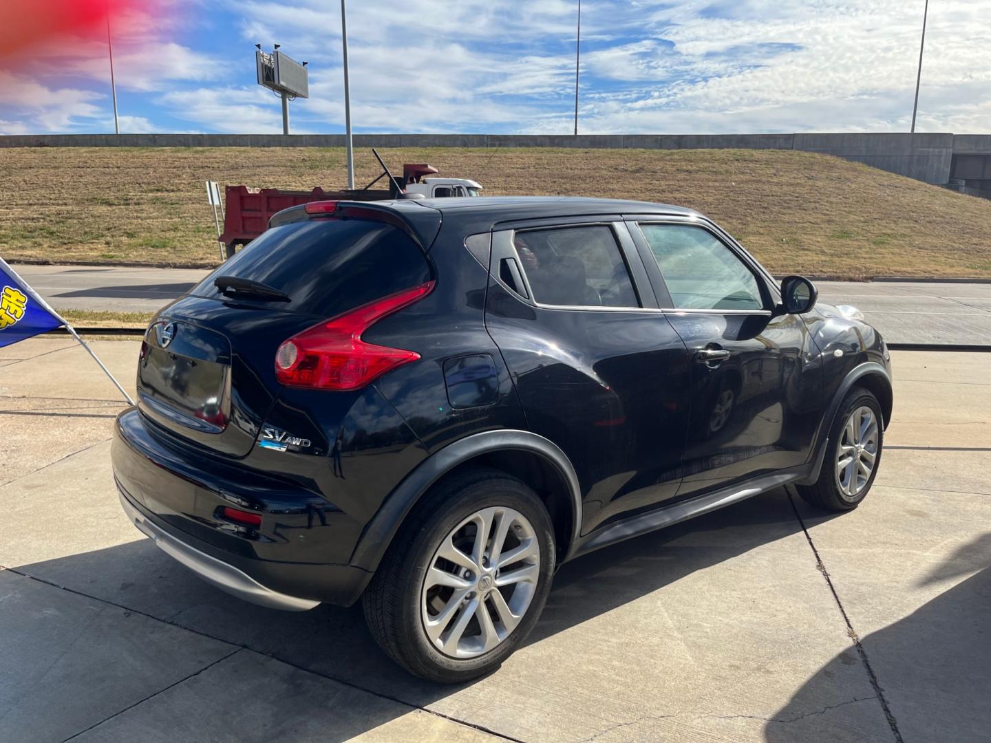 2013 BLACK NISSAN JUKE S; SL; SV; NISM S AWD (JN8AF5MV2DT) with an 1.6L L4 DOHC 16V engine, Continuously Variable Transmission transmission, located at 8101 E. Skelly Dr., Tulsa, OK, 74129, (918) 592-3593, 36.121891, -95.888802 - Photo#2